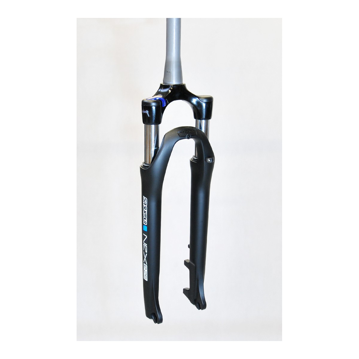 SF9-NEX-E25-N-D-M-T - NEX E25 28"skok 63mm TAPERED 25cm, blok.na goleni, dysk, sprężyna, mat
